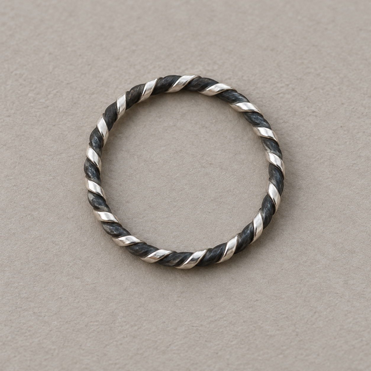 Interpretive rendering of a bright and dark twisted-wire ring